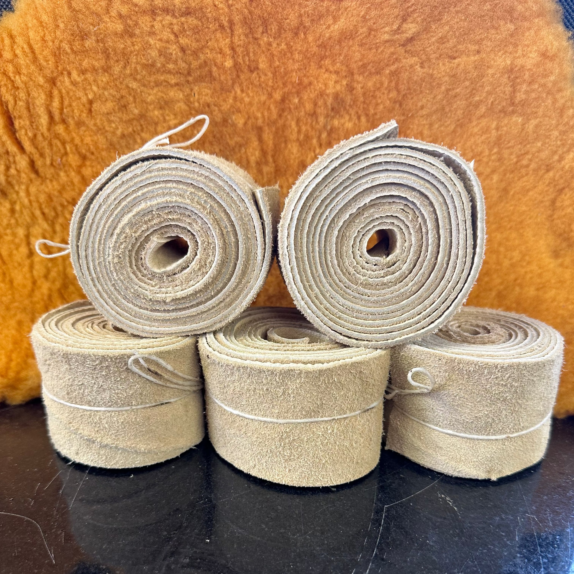 rolls of elk hide horn wraps